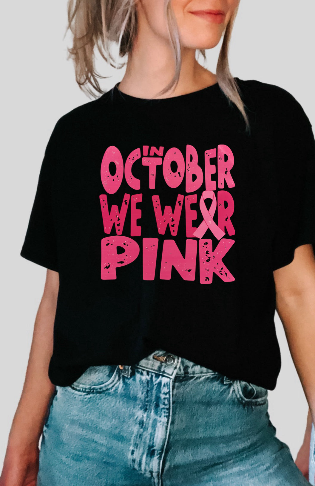 Black tee in October we wear pink.